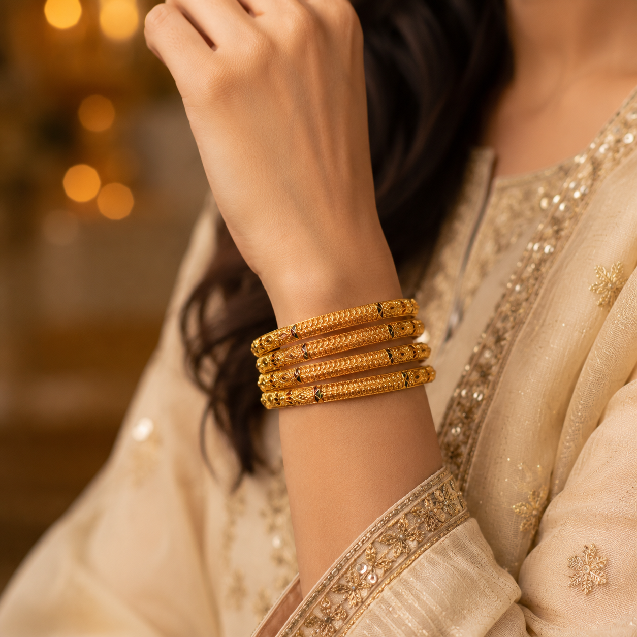 Traditional Four-Piece Intricate Gold Bangle Set with Meenakari Accents